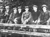 Young men on Bridge to Lords Meadow