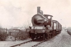 No 476 leaves the station, c.1905